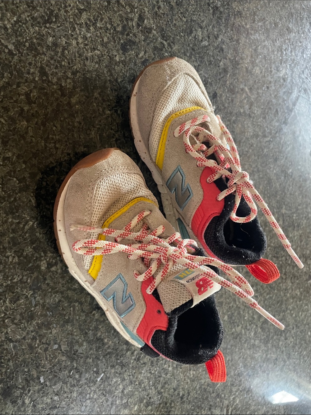 New Balance Kids Beige Sneakers with Red, Yellow & Blue Accents